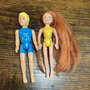 Polly Pocket Fashion Dolls Blonde Man Wearing Blue, Redhead Woman Wearing Yellow